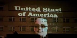 Germany is fighting to rescue US good (old) image. RT’s team detained filming Anonymous ‘United Stasi of America’ action.