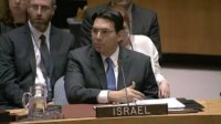 Israeli Ambassador to the UN holds Bible reacting to anti-Israel resolution